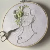 Cahier de broderie visages au trait